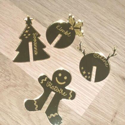 Marque-verres de Noël personnalisés avec prénom, disponibles en plusieurs modèles.
